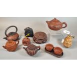 Mixed group of Yixing style Zisha clay pottery teapots, tea bowls and stand. (9) (B.P. 21% + VAT)
