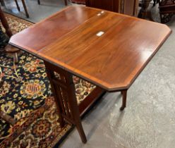 Edwardian mahogany inlaid Sutherland table together with an Edwardian mahogany inlaid tile top pot