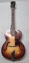 Hofner 'Compensator' acoustic six string guitar with sunburst body, registration 851997, in soft