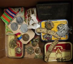 Box of Militaria to include: cap and other badges including Royal Corps, WVS Civil Defence, Home