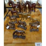 Tray of carved wooden figures of horses and a zebra. (B.P. 21% + VAT)