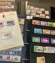 Collection of mostly Commonwealth stamps in three albums and large stockbook. Many 100s mint and