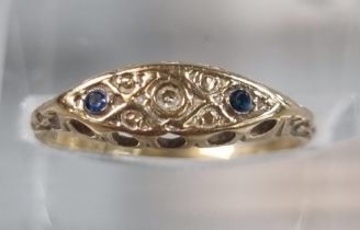 9ct gold and sapphire ring with small diamond chip. 0.8g approx. Size K. (B.P. 21% + VAT)