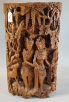 Asian woodcarving in high relief mythological tableau, to include a forest scene from the Hindu