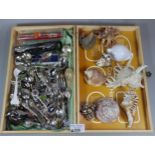 Wooden box comprising assorted souvenir spoons together with a box of marine shells. (B.P. 21% +