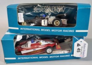 Two Scalextric Formula 1 racing cars to include: John Player Special and Ferrari 312 in associate