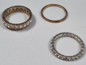 9ct gold ring. 0.6g approx. Size L1/2. Together with 9ct gold eternity style ring. 3.4g approx. Size