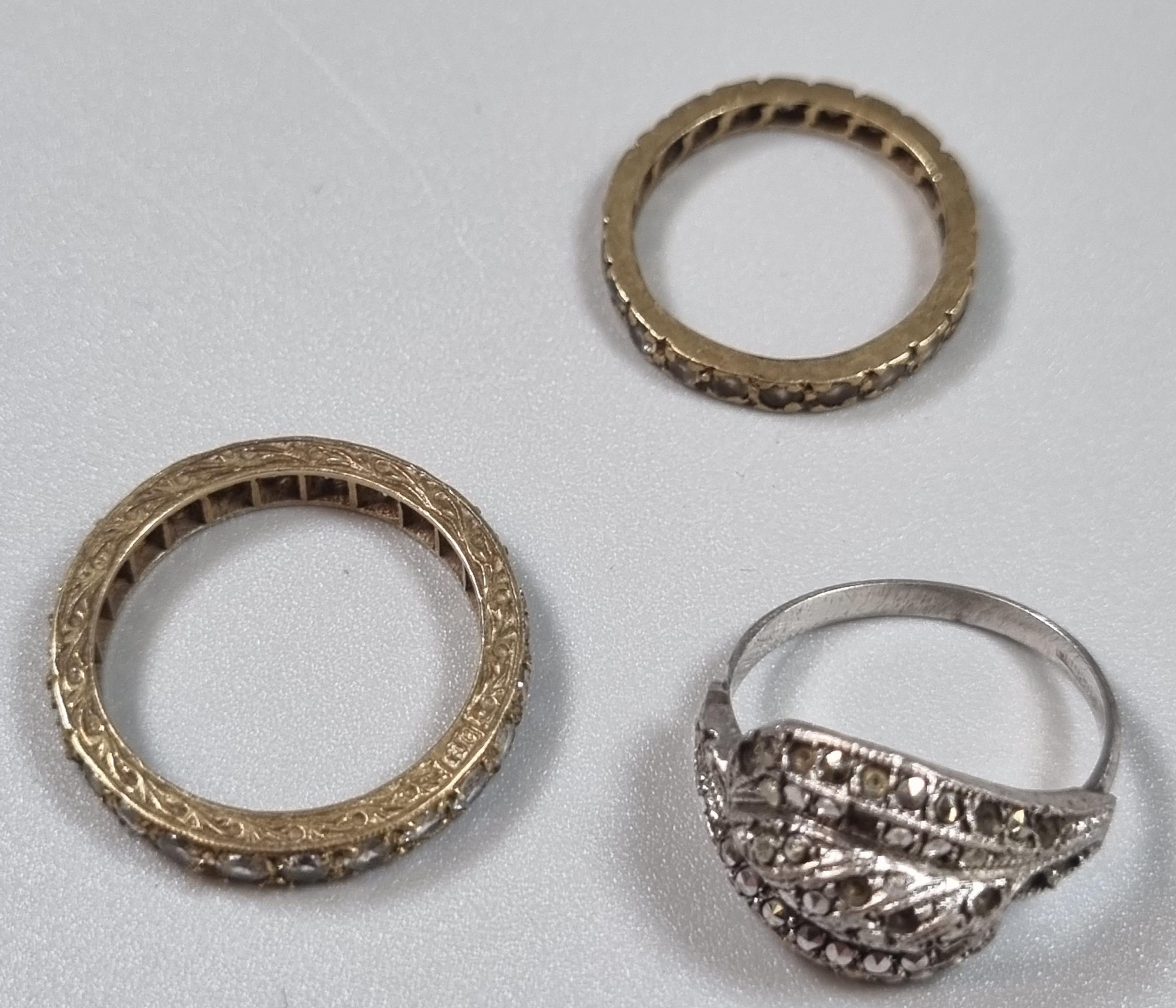 9ct gold eternity style ring. 1.7g approx. together with another eternity style ring and a marcasite