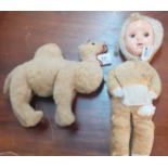 Vintage mohair soft toy camel together with a mid century doll with celluloid face and rolling