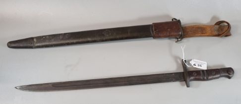 WWI period American Enfield type bayonet with metal scabbard and leather frog. Dated 1913. (B.P. 21%