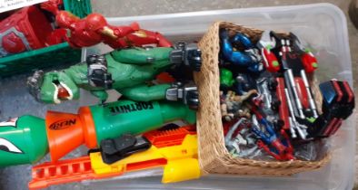 Two crates and one plastic box of toys to include: wrestling figures, Transformers, zoo animals,