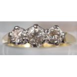 18ct gold three stone diamond ring. 3g approx. Size M. (B.P. 21% + VAT)