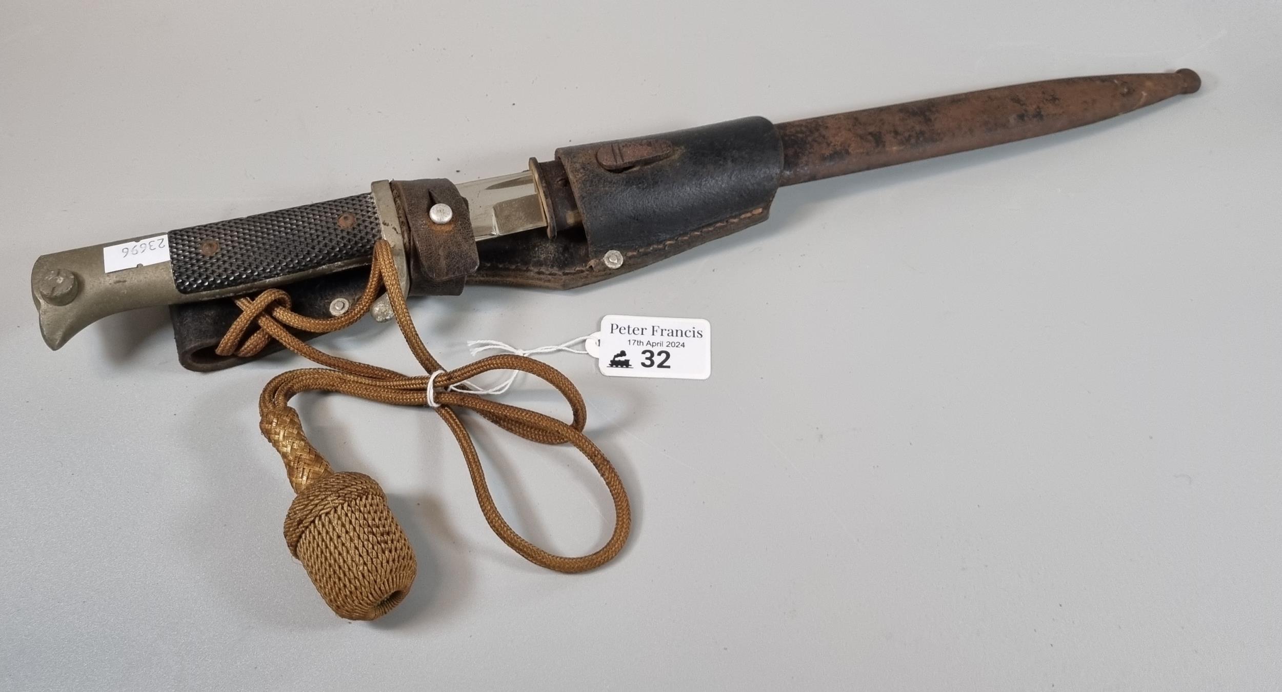 German Solingen bayonet with metal scabbard, leather frog and associated tassel. (B.P. 21% + VAT)