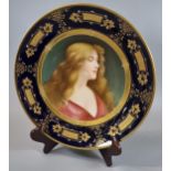Late 19th/early 20th Century Vienna porcelain dish with painted head and shoulders of a maiden.