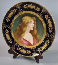 Late 19th/early 20th Century Vienna porcelain dish with painted head and shoulders of a maiden.