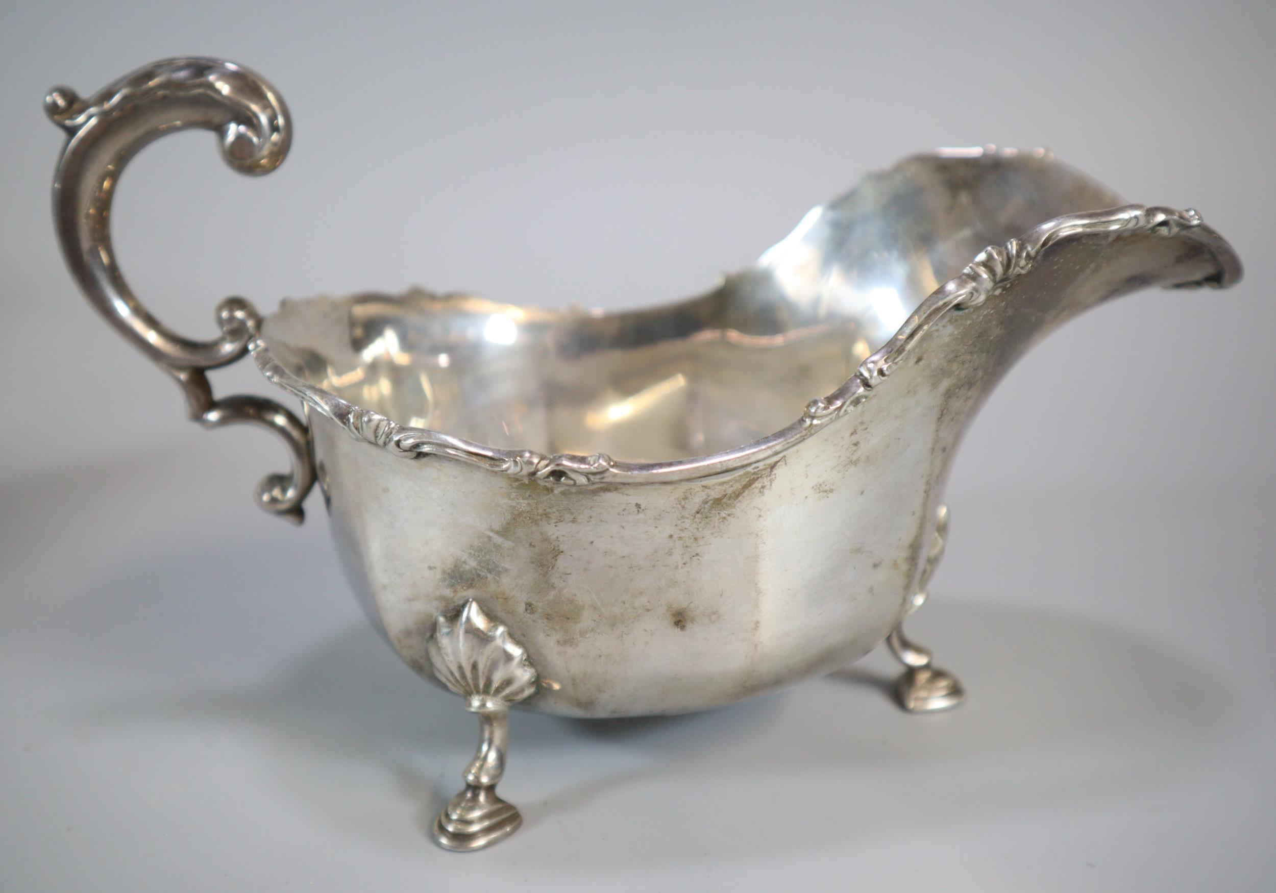 Pair of George V silver sauce boats each standing on three cabriole legs and hoof feet. By Josiah - Image 2 of 3