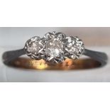 9ct gold three stone diamond ring. 1.4g approx. Size K1/2. (B.P. 21% + VAT)