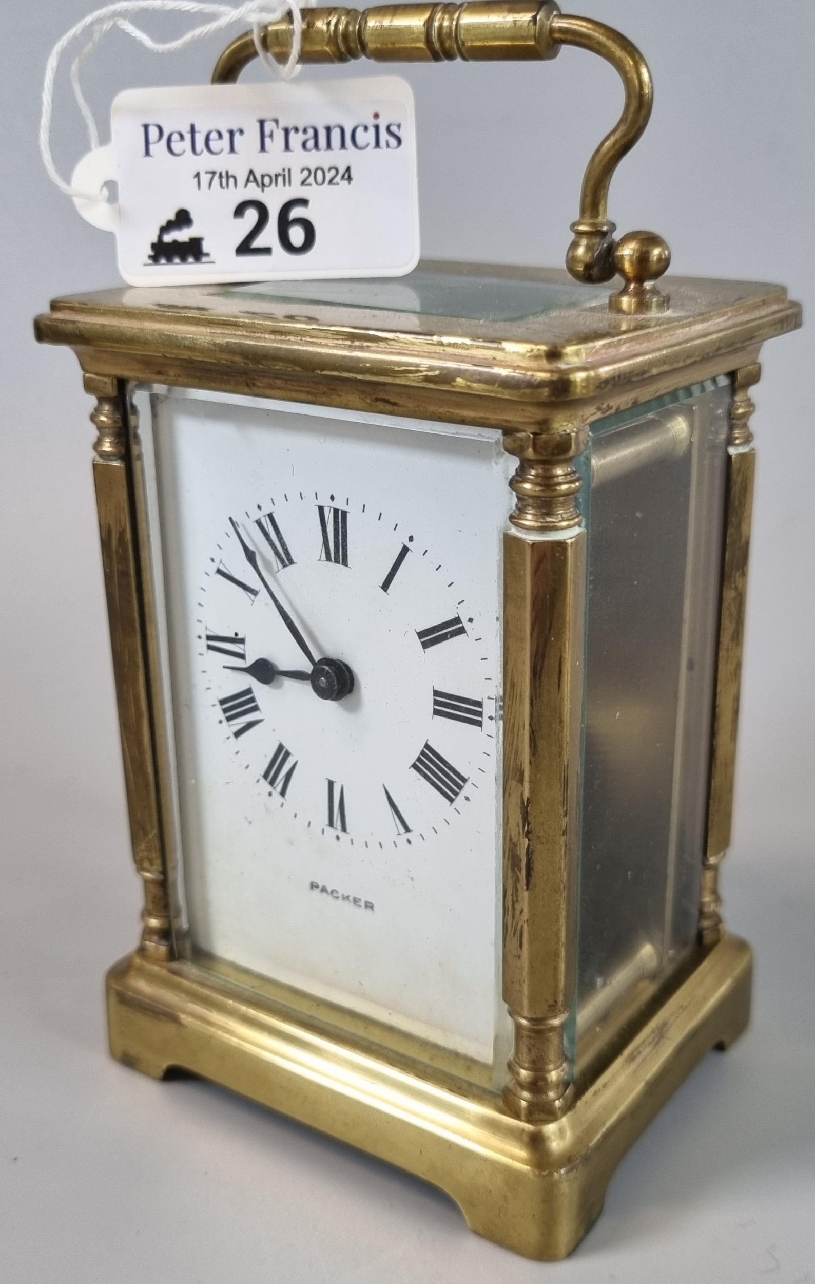 Brass carriage clock with Roman numeral face, marked 'Packer'. With key. (B.P. 21% + VAT)