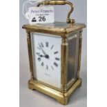 Brass carriage clock with Roman numeral face, marked 'Packer'. With key. (B.P. 21% + VAT)