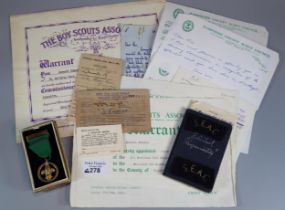 Box of Boy Scout ephemera to include: medal, warrants, S.A.E.A.C. shoulder pad etc. (B.P. 21% + VAT)