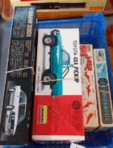 Four boxed model kits to include: Lindberg Toyata 4x4 pickup, BMW 320i two door saloon, Frog 1:72