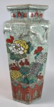 Oriental porcelain hexagonal polychrome vase depicting flowers and foliage on a crackled celadon