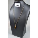 9ct gold chain with tiger's eye claw design pendant. 6g approx. (B.P. 21% + VAT)