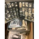 Box of old photographs in various albums and loose, mostly black and white family photos. 100s. (B.