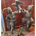 Pair of probably French spelter figures, one holding a bird, the other holding a fish, both with