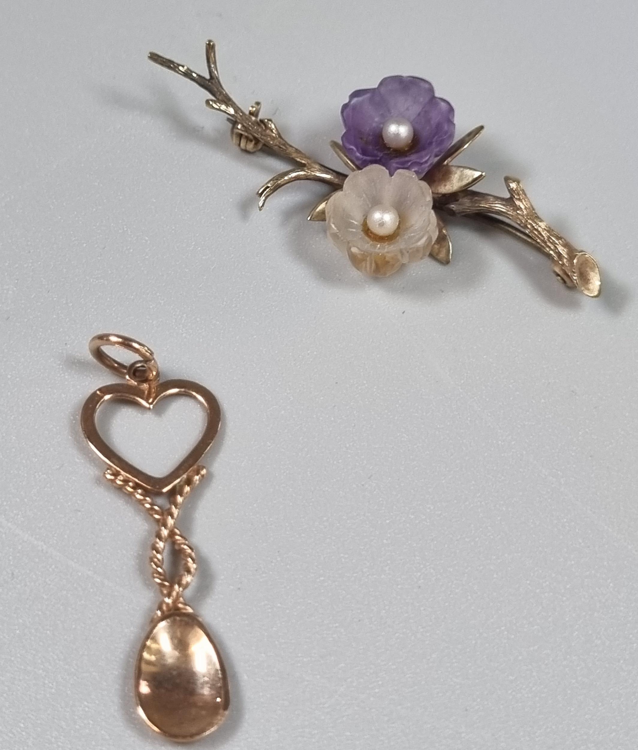 9ct rose gold love spoon charm (possibly Clogau). 1.4g approx. Together with 9ct gold floral and