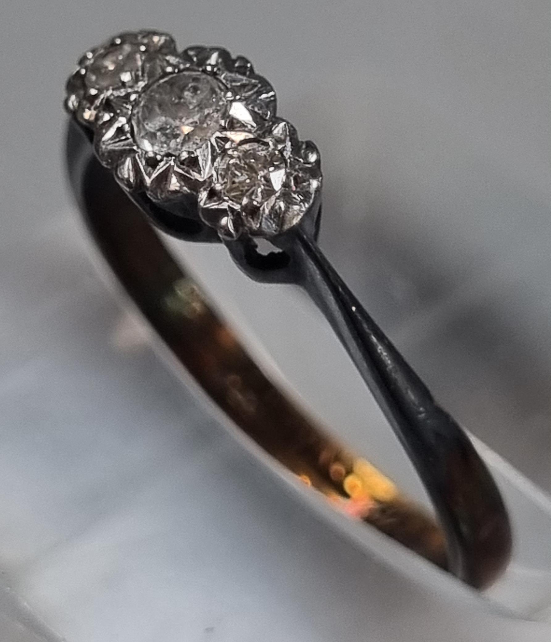 9ct gold three stone diamond ring. 1.4g approx. Size K1/2. (B.P. 21% + VAT) - Image 2 of 4