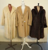 Three vintage ladies fur coats to include: a white musquash fur, a blonde harp seal fur coat by A.
