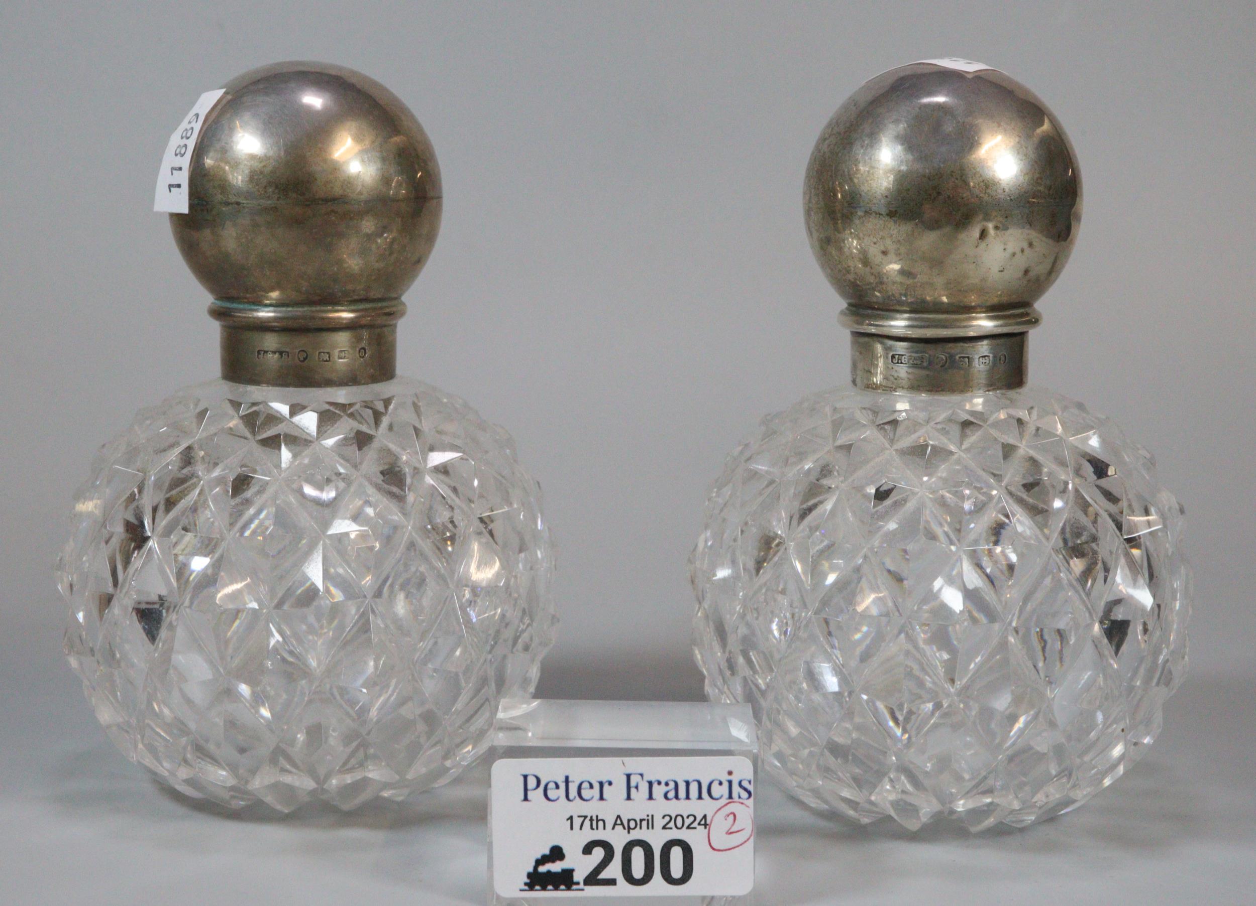 Two silver topped and hobnail cut ladies scent bottles with star-cut bases (2) (B.P. 21% + VAT)