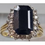 18ct gold diamond and black stone ring (possibly sapphire). 4.3g approx. Size L1/2. (B.P. 21% + VAT)