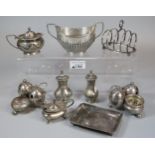 Collection of mainly silver items to include boat shaped two handled sucrier, condiments, card