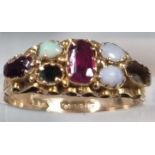 9ct gold opal and ruby ring (missing some stones). 1.4g approx. Size J. (B.P. 21% + VAT)