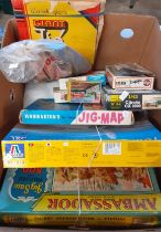 Two boxes of toys to include: Waddington's Jig Map, Airfix and similar model kits, diecast model