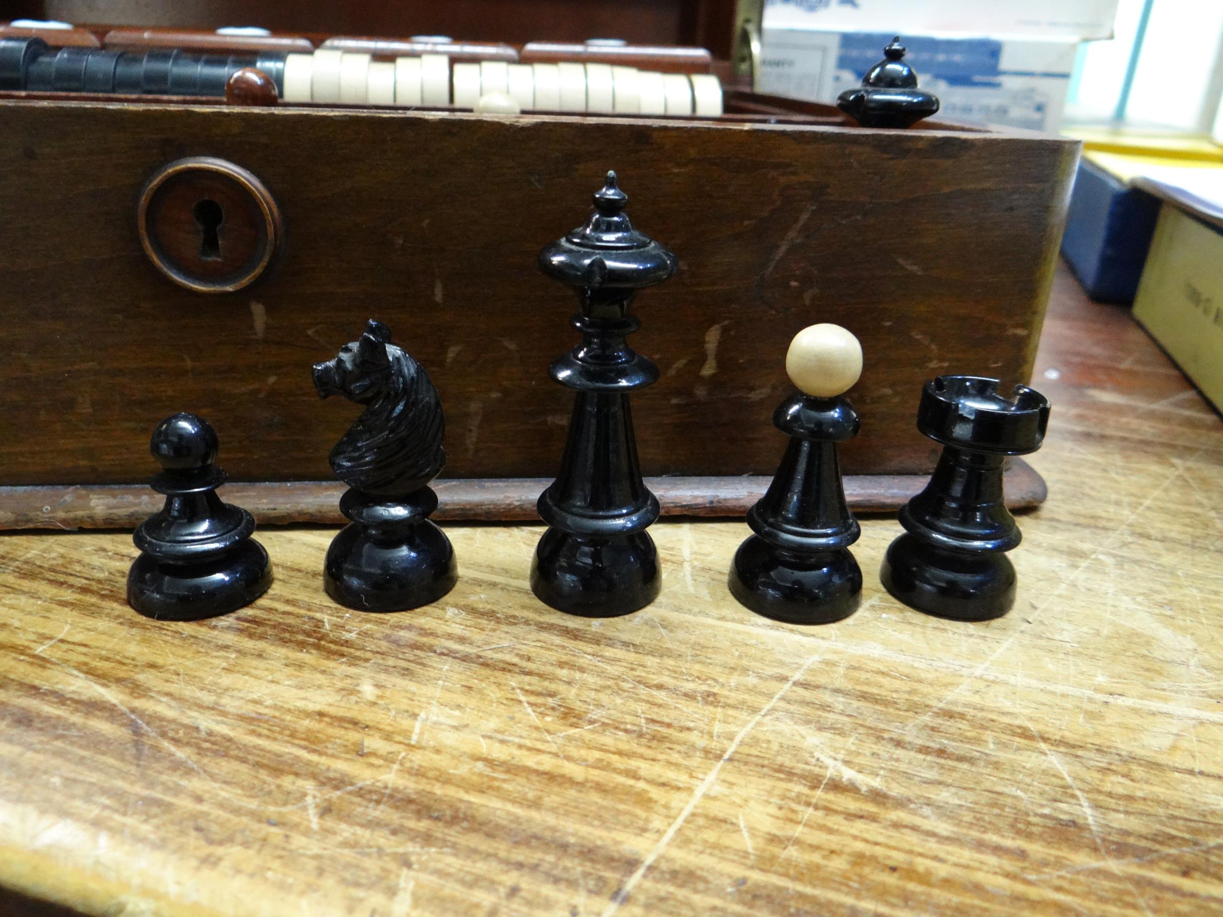 Early 20th century mahogany games compendium, the box containing various chess pieces, card boxes - Image 7 of 11