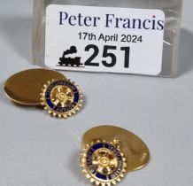 Pair of 9ct gold and enamel oval cufflinks marked 'Rotary International'. 6.9g approx. (B.P. 21% +