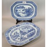 Two similar 18th century Chinese export porcelain blue and white meat platters, both depicting