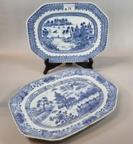 Two similar 18th century Chinese export porcelain blue and white meat platters, both depicting