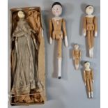 Collection of 19th century Grodnertal peg dolls, all with painted faces, one in particular with