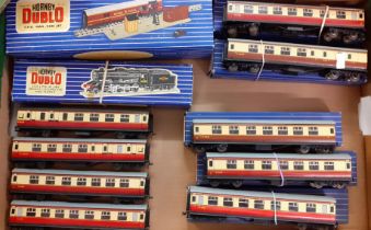 Large collection in four boxes of OO gauge trains and rolling stock to include: Hornby Dublo mail