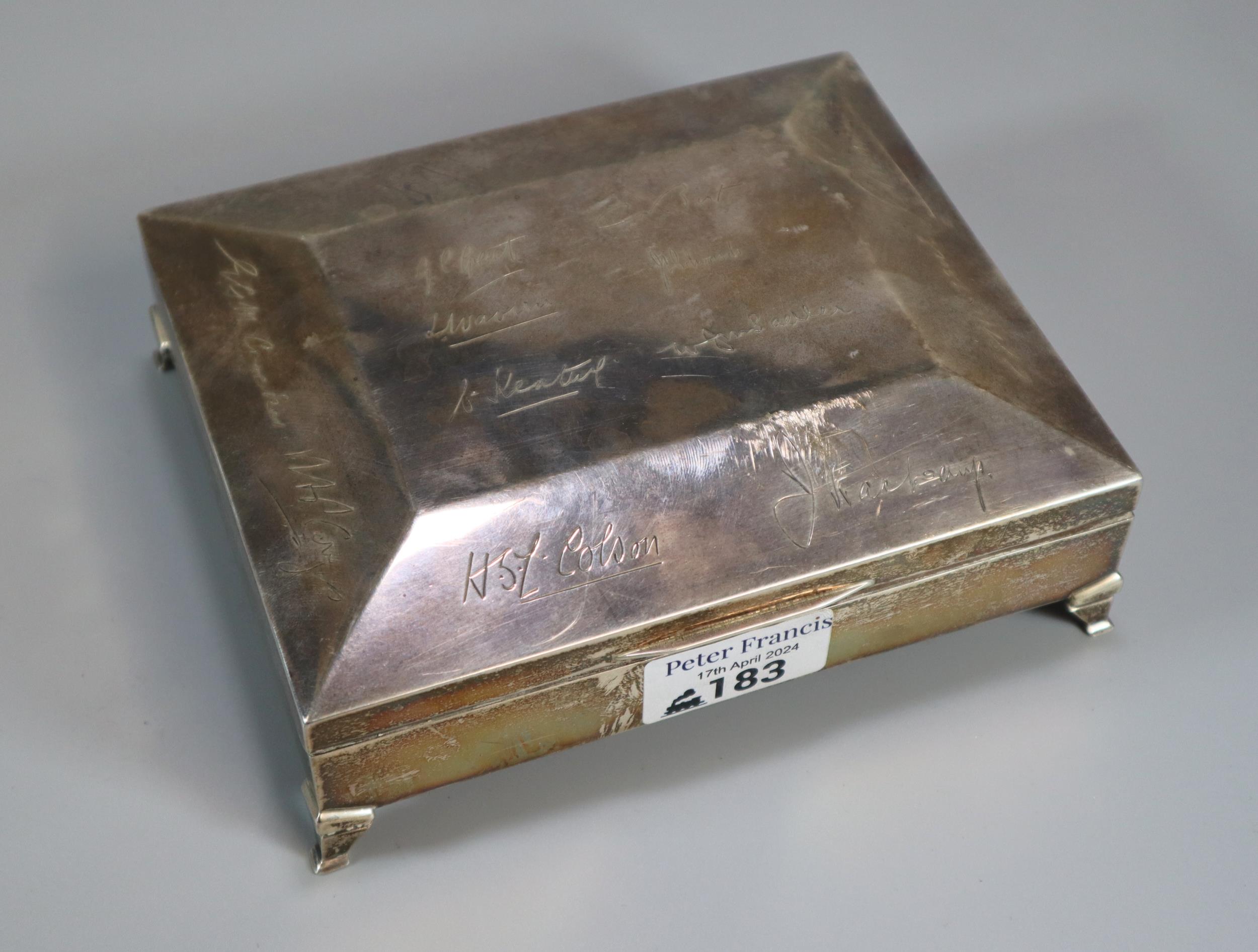 George V silver sarcophagus shaped presentation cigar box with facsimile signatures, by Harman