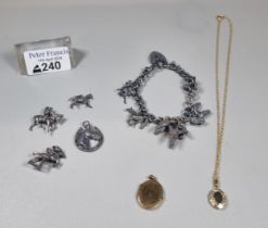 Silver charm bracelet with assorted charms including: poodles, horses etc. together with some