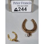 Two 9ct gold horseshoe charms. 8.2g approx. (B.P. 21% + VAT)