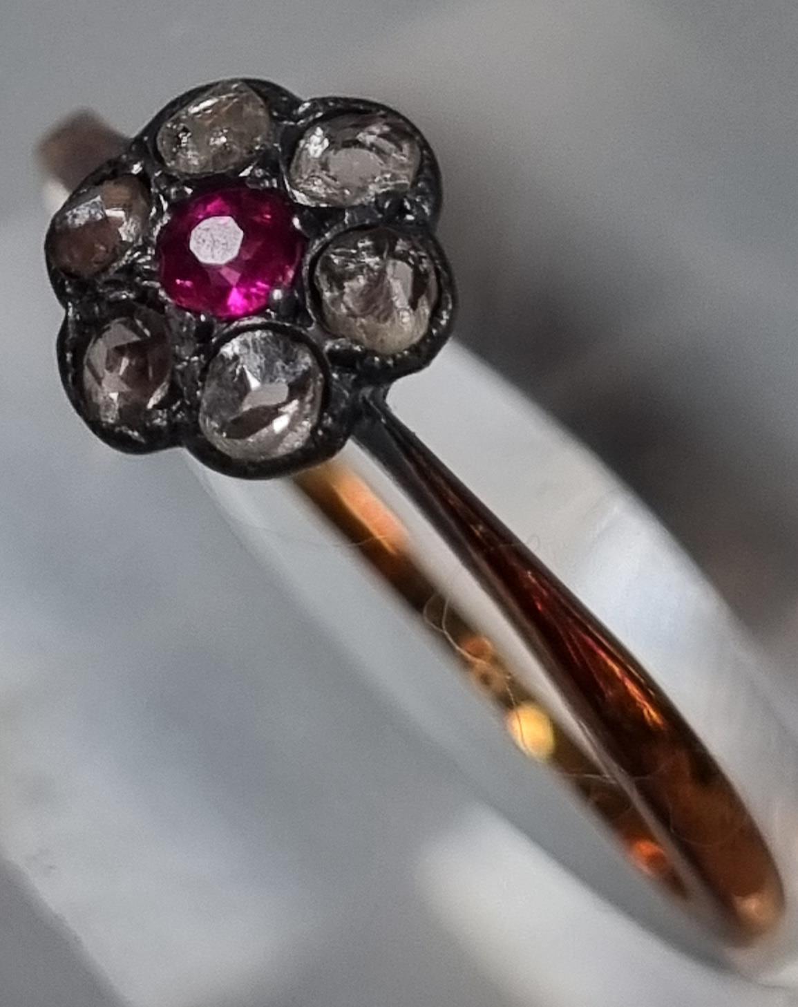 18ct gold diamond and ruby daisy ring. 2g approx. Size M1/2. (B.P. 21% + VAT) - Image 2 of 4