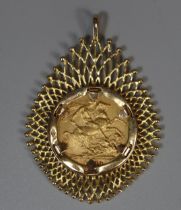 Queen Victoria gold Sovereign 1889, in 9ct gold filigree pendant mount. Total weight 14.9g