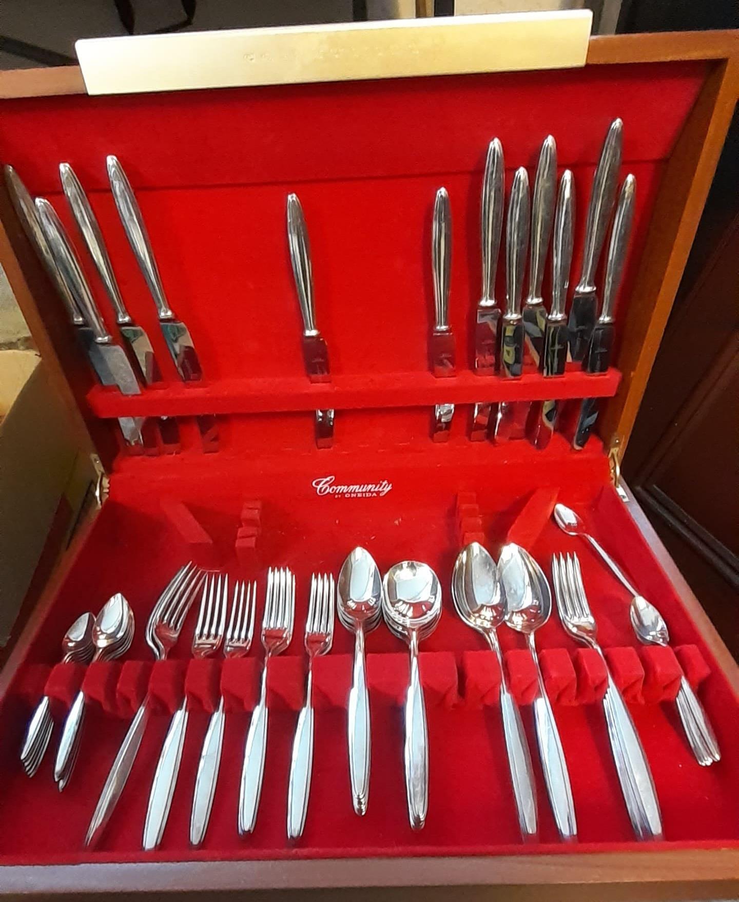 Cased canteen of silver plated cutlery marked 'Community' together with a box of oddments to