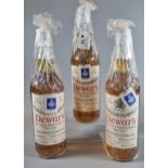 Three bottles of vintage Dewar's Finest Scotch Whisky of Great Age, 'White Label'. 70% proof. 26 2/3